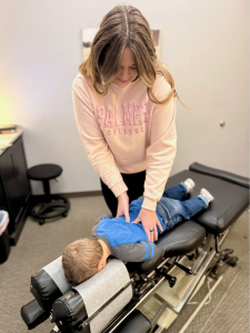 Pediatric back adjustment by the doctor
